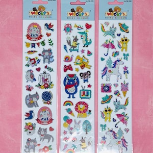 Stickers prismatiques animaux ludiques de Woody's. Licornes, chats et plus encore !