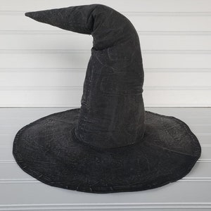 Painted & aged black witch hat with 12 inch brim that you can decorate