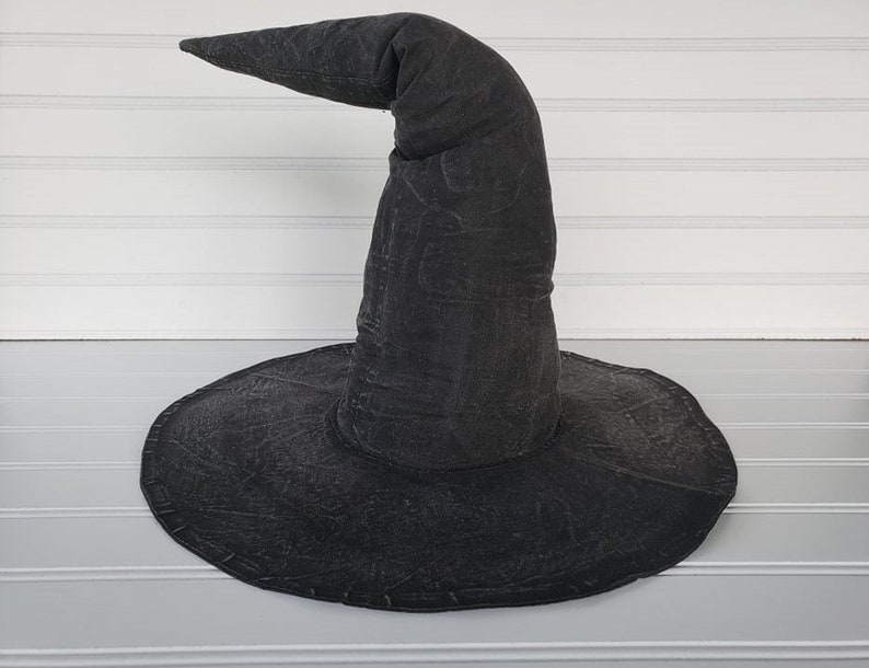 Painted & aged black witch hat with 12 inch brim that you can decorate