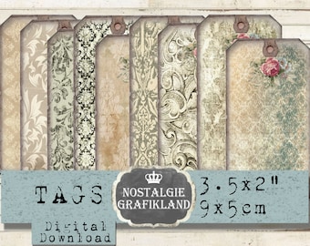 May include: Set of eight vintage-style printable gift tags with a damask pattern. The tags are 3.5 inches by 2 inches and feature a distressed, aged look. The text on the tags reads "TAGS" and "NOSTALGIE GRAFIKLAND".