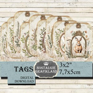 May include: A collection of vintage-style tags with botanical and bunny illustrations. Each tag features a unique design with floral elements and a distressed, aged appearance. The tags are 3x2 inches in size, with a small hole at the top for attaching.