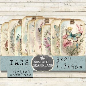May include: Set of ten vintage-style gift tags featuring a watercolor design of butterflies and flowers. The tags are 3 x 2 inches and have a distressed, aged look. The text "TAGS" and "NOSTALGIE GRAFIKLAND" is printed on the tags.