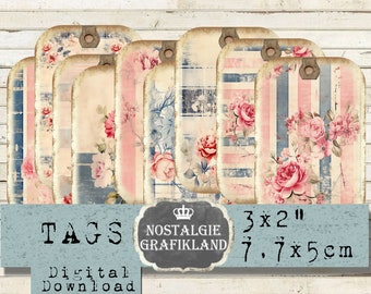 May include: Set of eight vintage-style printable gift tags with a pink and blue striped background and floral designs. The tags are 3 x 2 inches or 7.7 x 5 cm. The text on the tags reads "NOSTALGIE GRAFIKLAND".