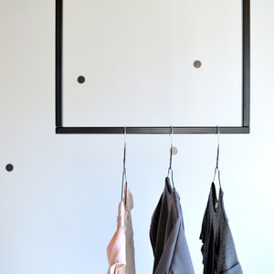 Ceiling clothes rack// Clothing rack // Ceiling rack // Ceiling storage // Retail display // Ceiling clothing rail//Minimalist clothing rack