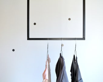 Plafondkledingrek//kledingrek//plafondrek//plafondopslag//retaildisplay//plafondkledingrail//minimalistisch kledingrek