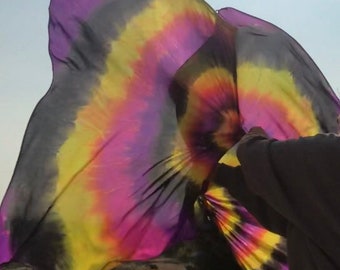 Hand dyed silk spin flags. Extremely UV reflective.  Knock their socks off at your next black light event!  Made To Order