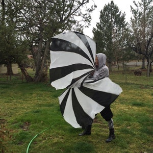 Silk swing flags Pair of hand painted spin flags. This pattern creates amazing visual effects. Glow in black light!
