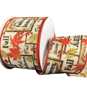 May include: A roll of beige and orange ribbon with a fall theme. The ribbon features a repeating pattern of maple leaves, berries, and text that says "Fall", "Falling Leaves", and "Fall Autumn".