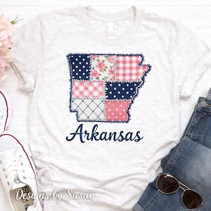May include: A rustic wooden sign with the text "Welcome to our home" in a handwritten style. The sign features a distressed finish and a simple, inviting design, perfect for entryway decor.