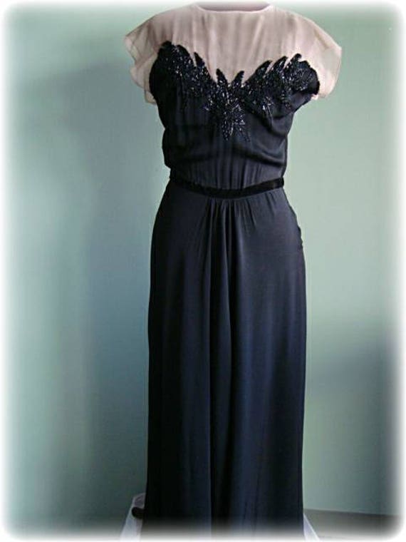 Statuesque 1940's crepe gown with sheer bodice and