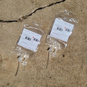 Two empty not weathered blood bag props.