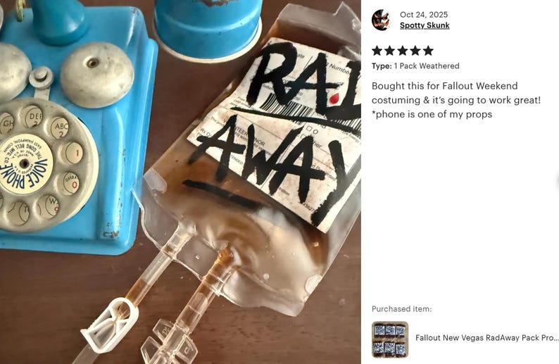 May include: A clear plastic IV bag filled with a brownish liquid, featuring the text RAD AWAY written in bold black letters on a white label. The bag includes attached clear plastic tubing with a white plastic clamp and a blue rotary telephone.