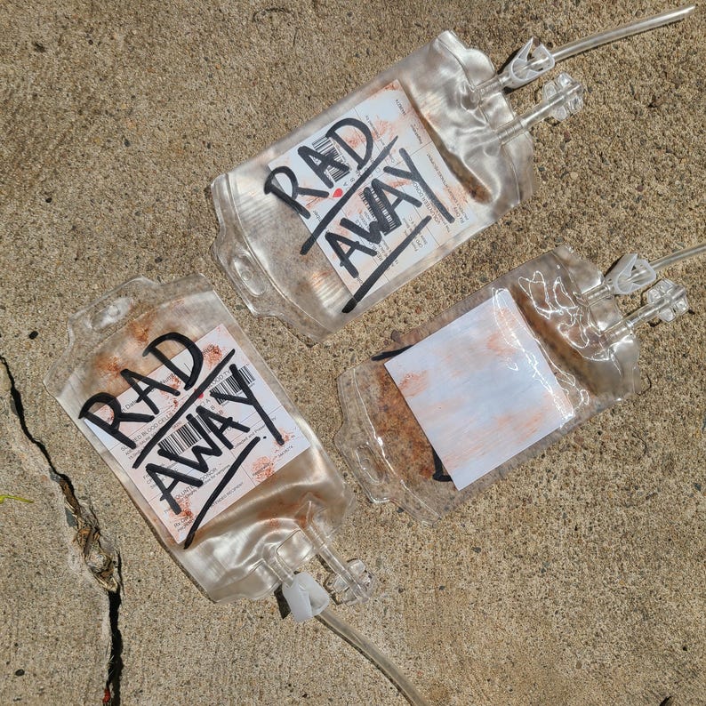 Three empty weathered Rad Away bags.