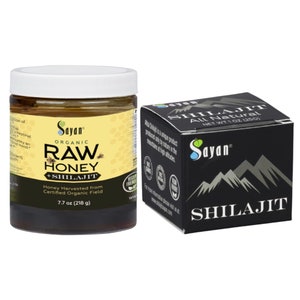 May include: A glass jar of raw honey with shilajit, labeled "Sayan Organic Raw Honey + Shilajit", with a black box of shilajit labeled "Sayan Shilajit All Natural".