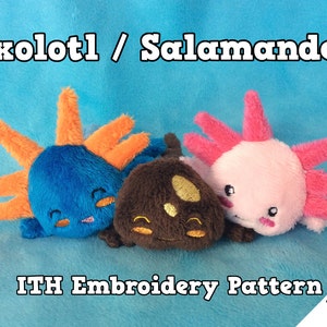 以下が含まれることがあります： 青、茶色、ピンクの3匹のぬいぐるみウーパールーパー。オレンジ色またはピンク色のフリルが付いています。「Axolotl / Salamander」と「ITH Embroidery Pattern」の文字が青い背景に表示されています。ウーパールーパーは約10cm x 10cmです。