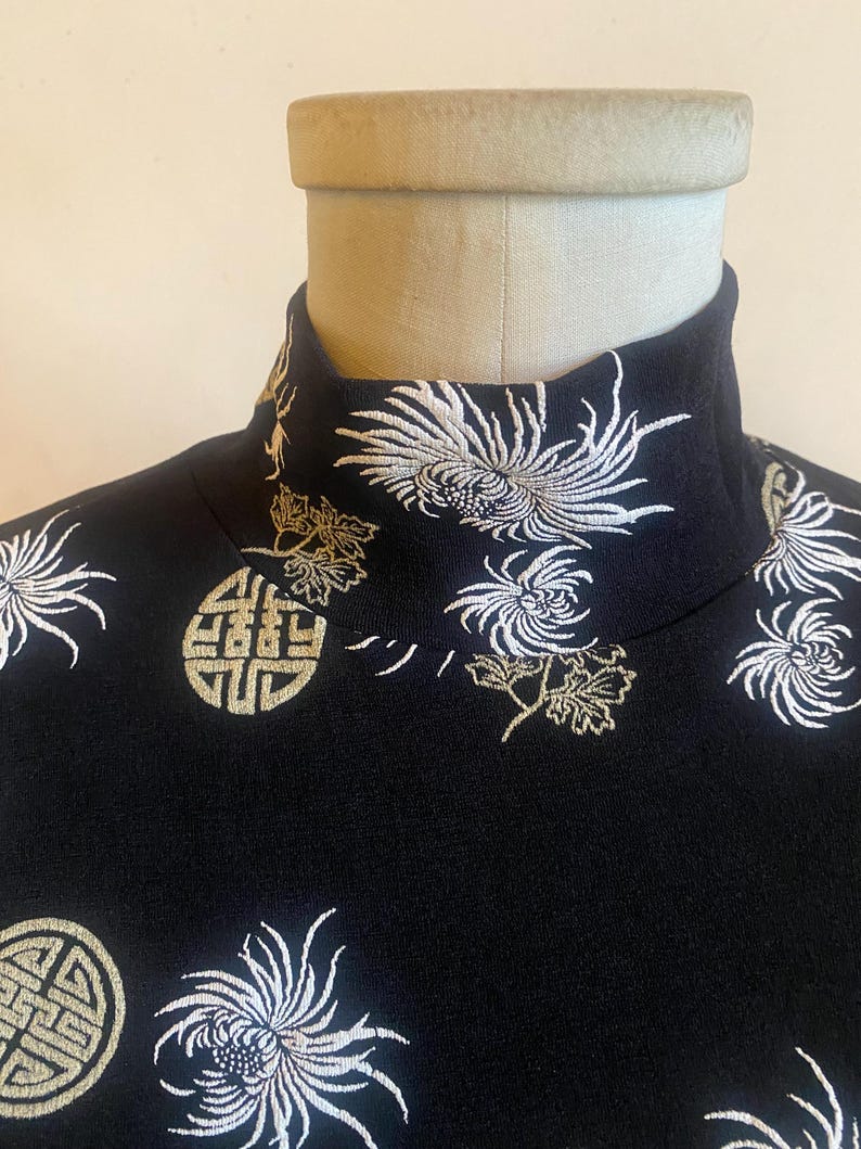 Floral Turtle Neck Top by Frazier Lawrence