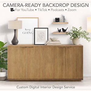 May include: A camera-ready backdrop design with a wooden cabinet, framed art, and decorative items. A lamp with a beige shade and a potted plant are on the left. The text "Keep Going" is visible on a framed print. A custom moodboard is also shown.