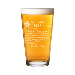 May include: A clear glass beer mug with a humorous prescription label that reads "Prescription: BEER 1 pint. Patient Name: Steven Thompson. Dosage: To be taken once daily. Ideally to be consumed cold. If problems persist, double the dosage until symptoms ease and you feel more hoptimistic. Prescribed by: Dr B. Hops."