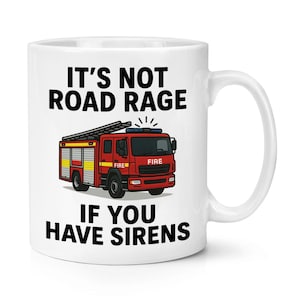 May include: White ceramic mug with a red fire engine illustration and the text "IT'S NOT ROAD RAGE IF YOU HAVE SIRENS". The fire engine has yellow and red details.