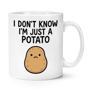 May include: White ceramic mug featuring the text "I DON'T KNOW I'M JUST A POTATO" in black. A cartoon potato with a sad expression is below the text. The mug has a curved handle.