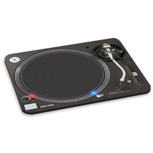 May include: A black turntable with a silver tone arm and a circular platter. The turntable has a dark grey base with a silver rim around the platter. Red and blue lights are visible on the base.