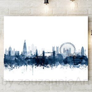 May include: A watercolor painting of the London skyline in shades of blue. The skyline includes iconic landmarks like the London Eye, Big Ben, and the Shard.