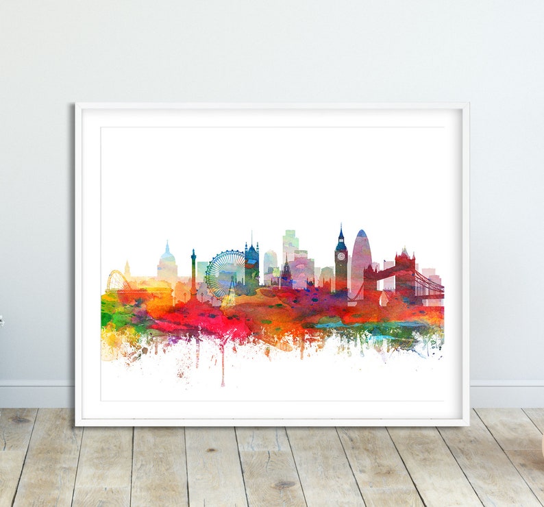 Puede incluir: Una pintura de acuarela del horizonte de Londres, que presenta monumentos emblem&aacute;ticos como el Big Ben, el London Eye y el Tower Bridge. La ciudad se representa en colores vibrantes, con salpicaduras de rojo, naranja, amarillo, verde, azul y morado.