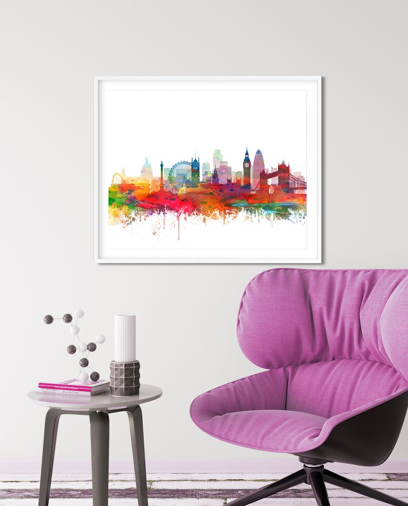 Puede incluir: Una pintura de acuarela del horizonte de Londres, con monumentos emblem&aacute;ticos como el London Eye, el Big Ben y el Tower Bridge. La pintura est&aacute; realizada en un vibrante arco&iacute;ris de colores, con salpicaduras de pintura que se extienden m&aacute;s all&aacute; del horizonte.