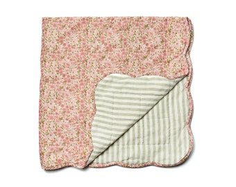 Quilt made from Liberty fabric 'Poppy and Daisy Pink'