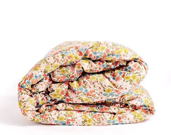 Bedding made with 'Poppy and Daisy Multi'