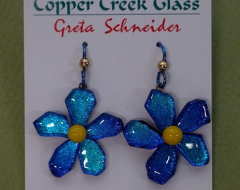 Cute and colorful dichroic glass flower earrings by Greta Schneider