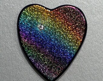 Pretty Rainbow Dichroic Textured Heart with Sparkliing CZ Accent.