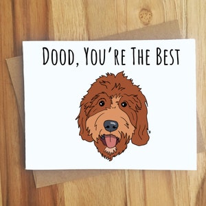May include: A greeting card with a cartoon illustration of a brown and white dog with the text "DOOD, YOU'RE THE BEST" on a white background.