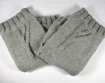 Grey Wizard Gloves, a pair of fingerless gloves marked with a wizard’s rune