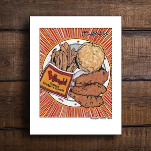 May include: A white card with a red and orange background featuring a cartoon illustration of a plate of food. The plate contains fried chicken tenders, french fries, and a biscuit. The text "Bojangles' Famous Chicken 'n Biscuits" is on the card.