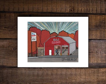 Op de afbeelding: Een handgeschilderde illustratie van een rood gebouw met een wit bord waarop "Rebel Barn" staat en een bord waarop "Cold Beer!" staat. Het gebouw wordt omringd door bomen met rode, oranje en gele bladeren. De lucht is blauw met witte lichtstralen. De tekst "J-MAN" staat onderaan de afbeelding in het zwart.