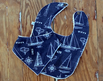 Navy nautical sailboat baby feeding or drool bib, blue white, terrycloth back, snap closure, infant toddler