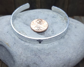 Hand Stamped Aluminum Bangle Bracelet - Lightweight - Medical Symbol