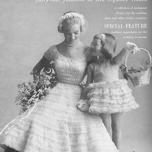 May include: A black and white photo of a woman and a young girl wearing white crocheted dresses. The woman is wearing a veil and holding a bouquet of flowers. The girl is holding a basket of flowers. The text "NOMOTTA fairy-tale fashions in silk organdy ribbon" is at the top of the image. The text "SPECIAL FEATURE knitting suggestions for the wedding trousseau" is in the middle of the image.
