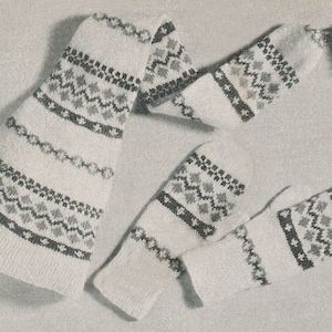 May include: A white knitted hat and matching mittens with a black and grey geometric pattern.