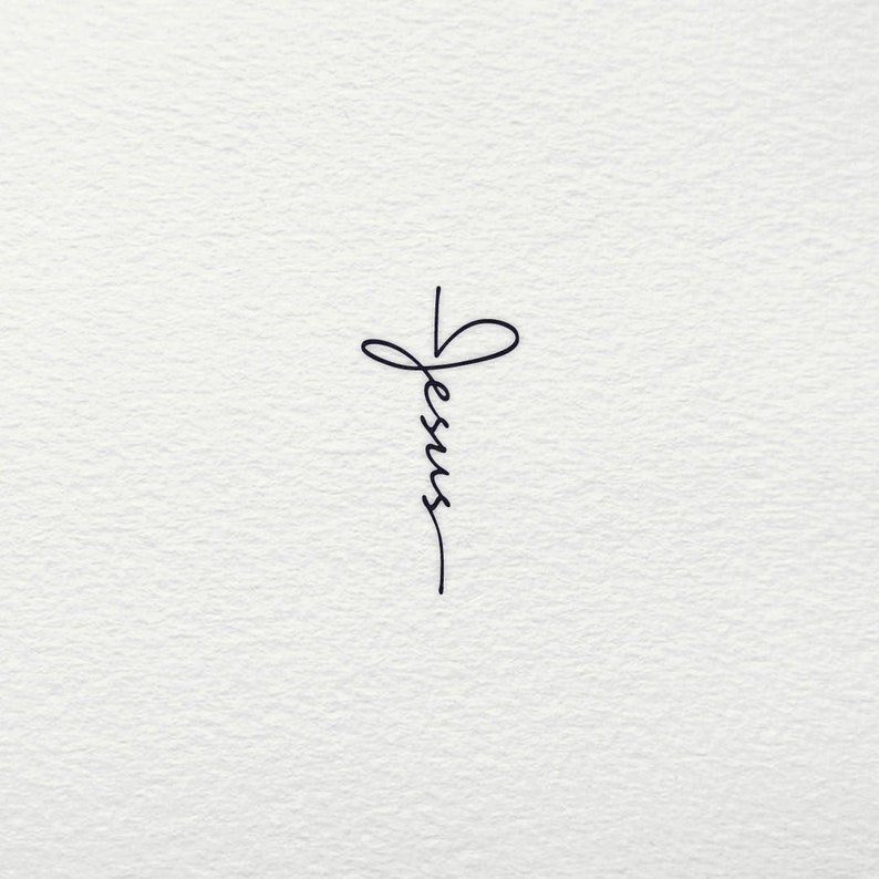 May include: A simple black and white illustration of a cross with the word "Jesus" written vertically down the center.