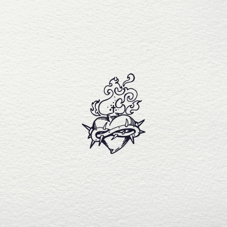 May include: A black and white line drawing of a heart with a crown of thorns and flames above it.