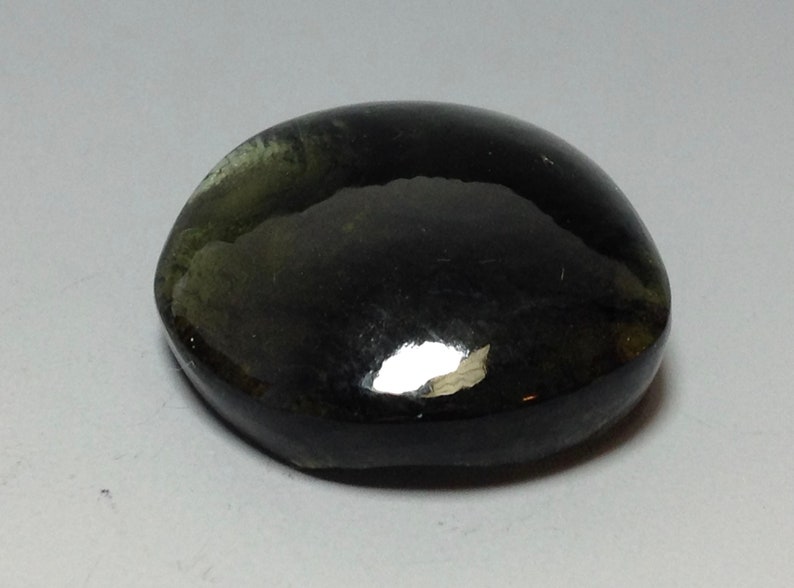 Moldavite cabochon 21x20x7mm
