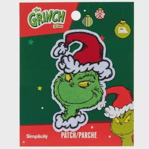May include: Green Grinch character wearing a red and white Santa hat with the text "The Grinch" and "Dr. Seuss" on a green and white background. The text "Patch/Parche" is also visible.