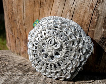 Wallet made from recycled can capsules