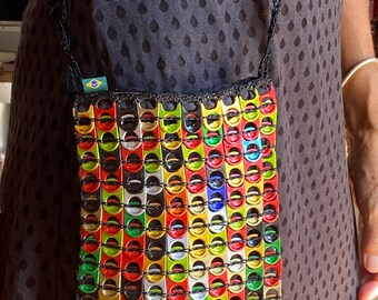 Pouches made from recycled can capsules