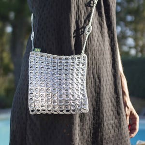 Pouches made from recycled can capsules