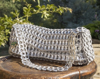 Handbag or shoulder bag made from recycled can capsules