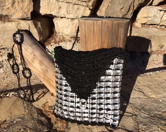Pouch made from recycled can capsules