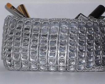 Makeup bag or evening pouch made from can caps